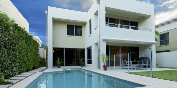 modern white villa with pool